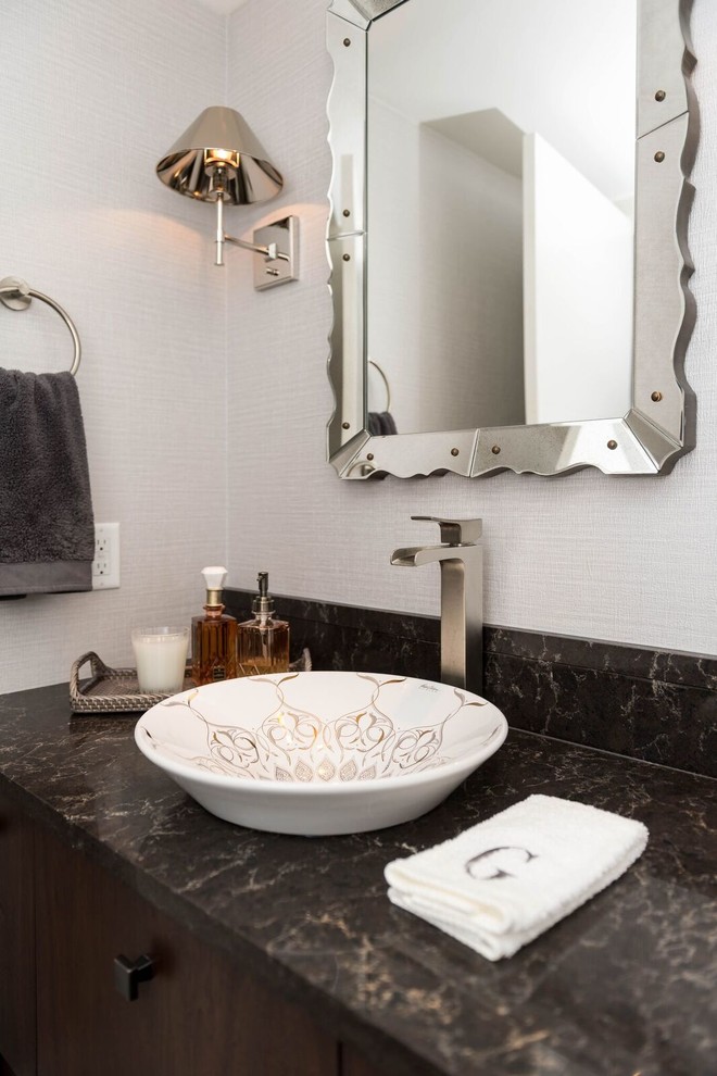 Inspiration for a mid-sized transitional bathroom in Vancouver with flat-panel cabinets, dark wood cabinets, beige walls, a vessel sink and granite benchtops.