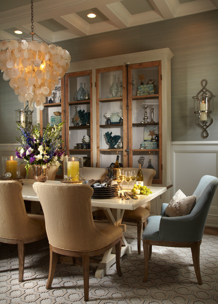 Inspiration for a tropical dining room in Tampa with grey walls and dark hardwood floors.