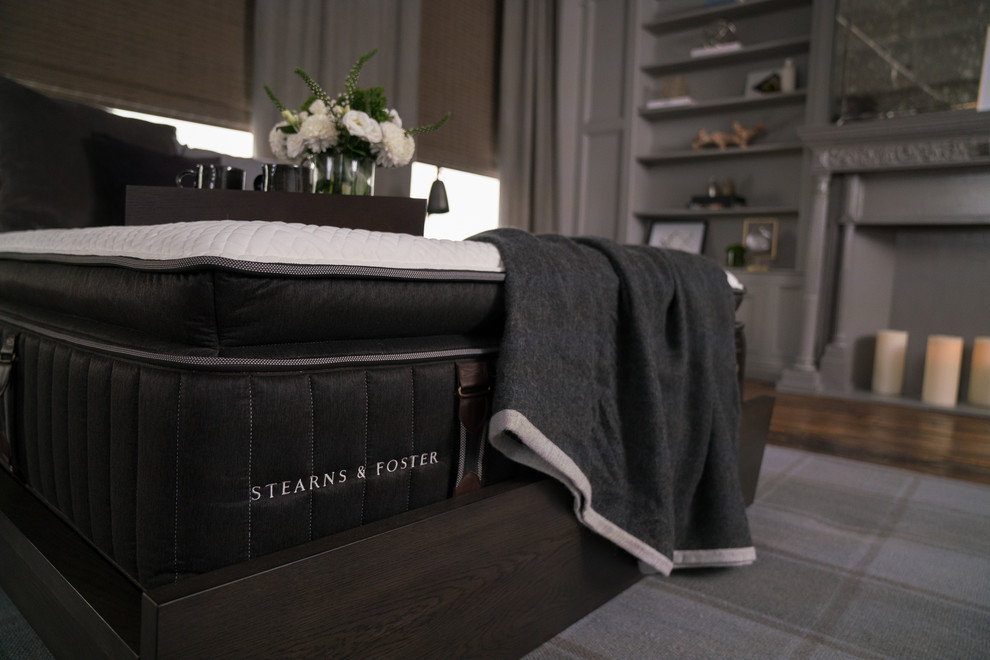 Example of a transitional bedroom design in Austin