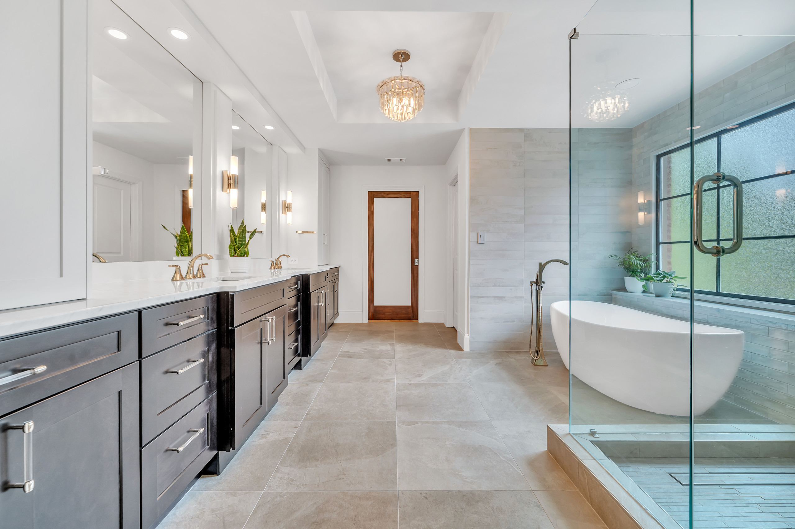 From Builder Grade From the 90’s to a Modern and Sophisticated Spa Feel