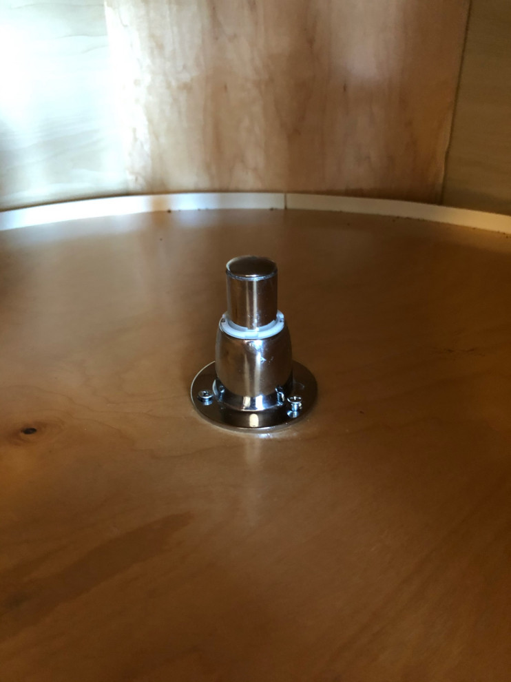Repair of a wobbly lazy Susan without a center pole.