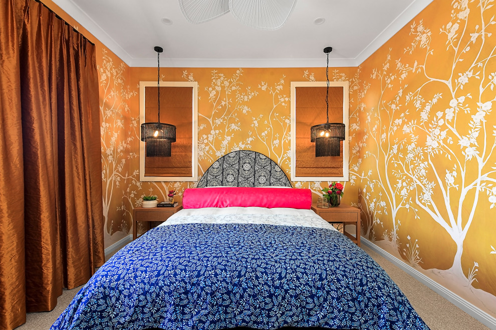 Inspiration for a mid-sized asian master bedroom in Sydney with yellow walls, carpet, grey floor and wallpaper.