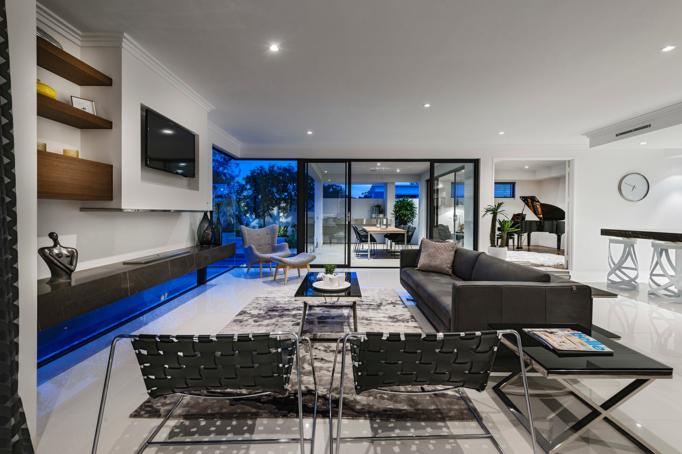 Contemporary family room in Perth with white walls and a wall-mounted tv.