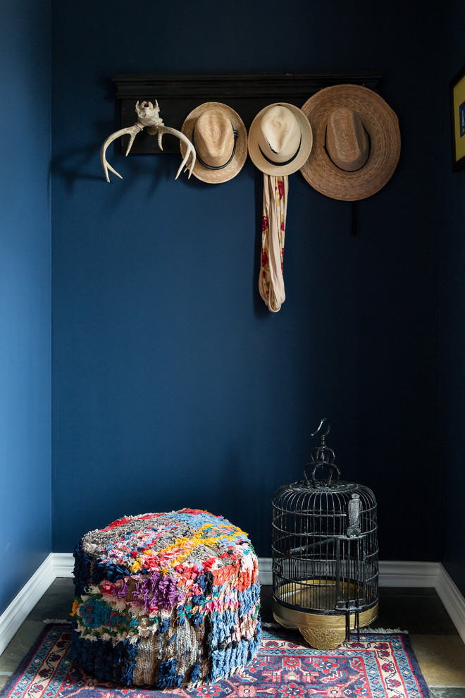 Inspiration for a country entryway in New Orleans with blue walls.