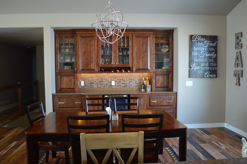 Example of a large mountain style home design design