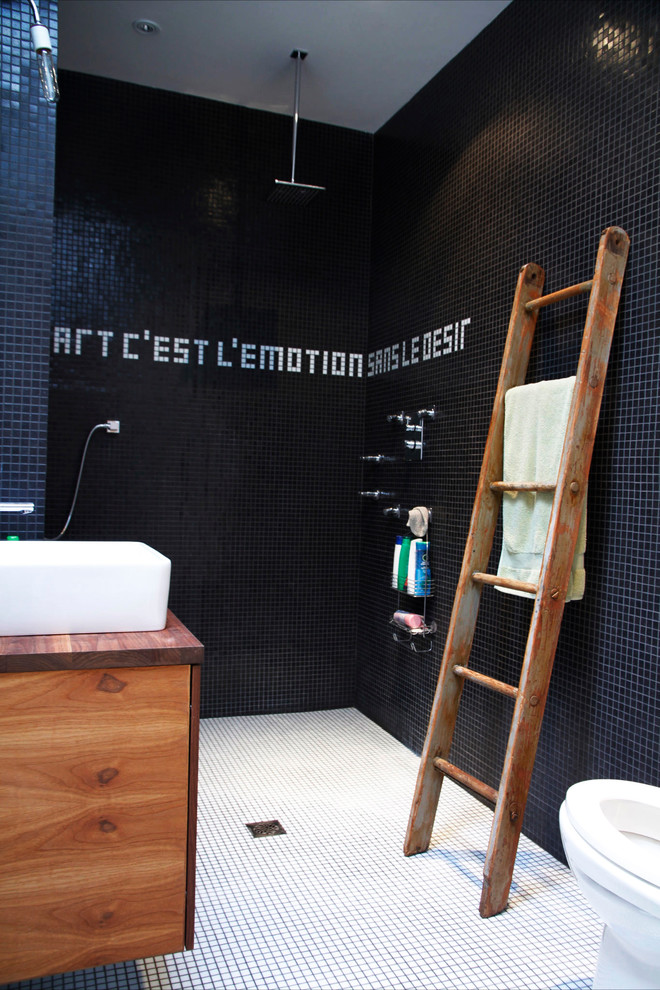 Inspiration for an industrial bathroom in Montreal with an open shower, mosaic tile and an open shower.