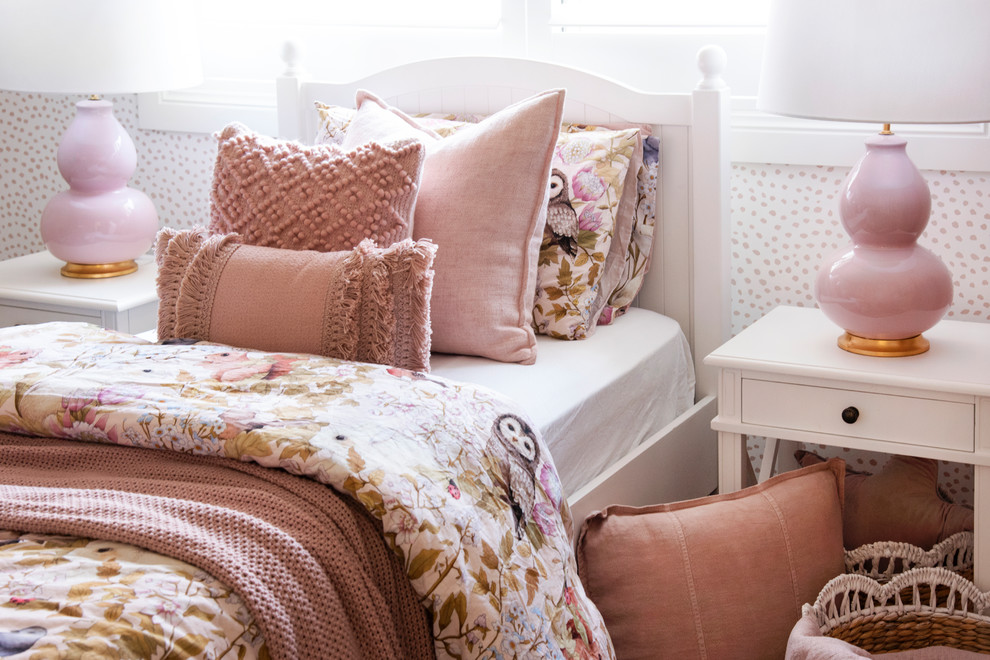 Mid-sized contemporary kids' bedroom with pink walls, carpet and beige floor for kids 4-10 years old and girls.