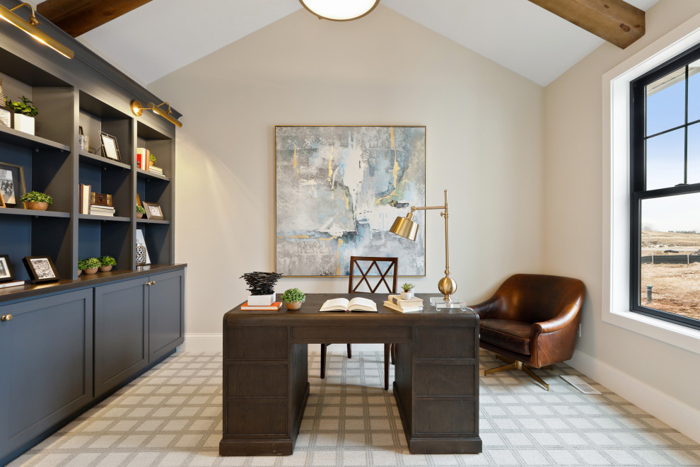 Transitional study room in Minneapolis with beige walls, carpet, no fireplace, a freestanding desk, multi-coloured floor, exposed beam and vaulted.