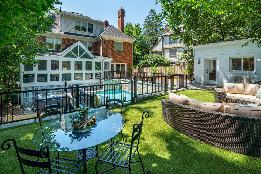 Pool landscaping - huge transitional backyard stone and rectangular pool landscaping idea in DC Metro