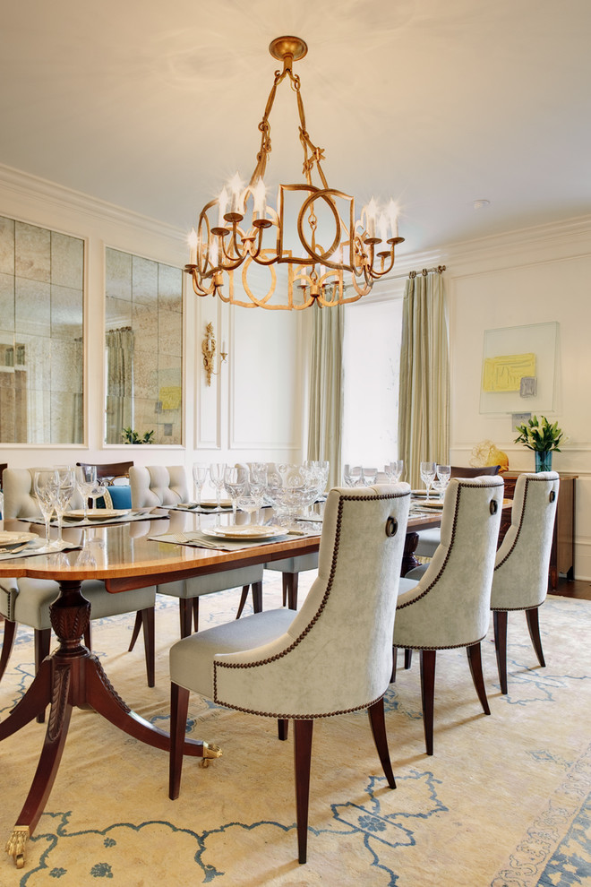 Traditional dining room in Richmond with white walls.