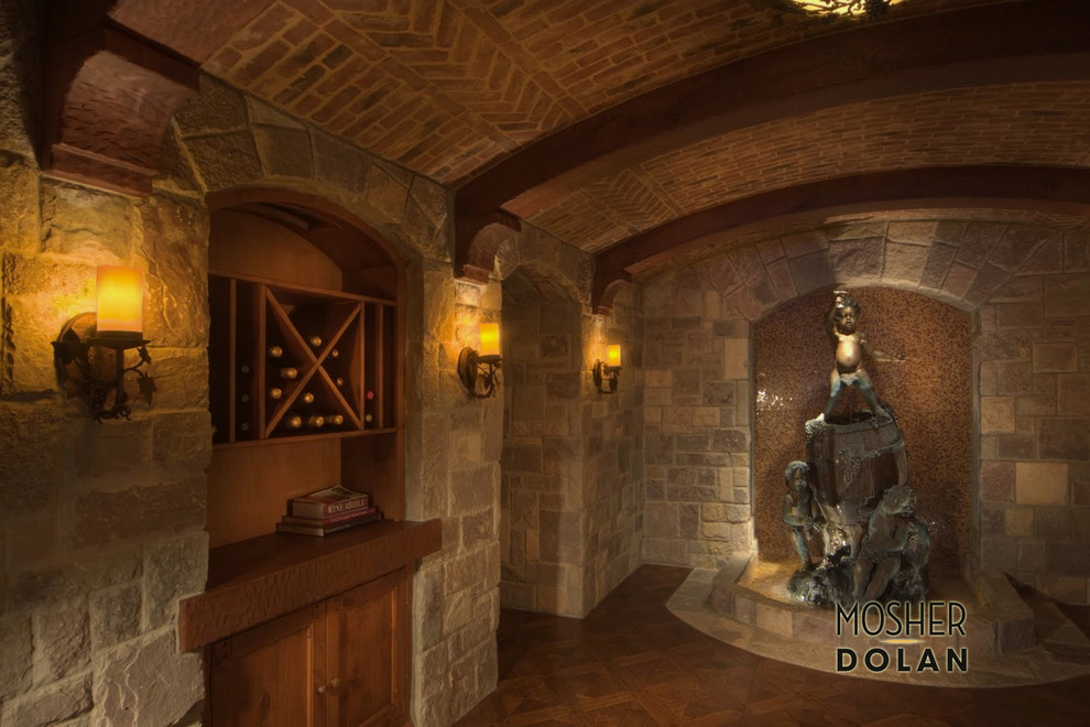 Expansive traditional wine cellar in Detroit with dark hardwood floors and diamond bins.