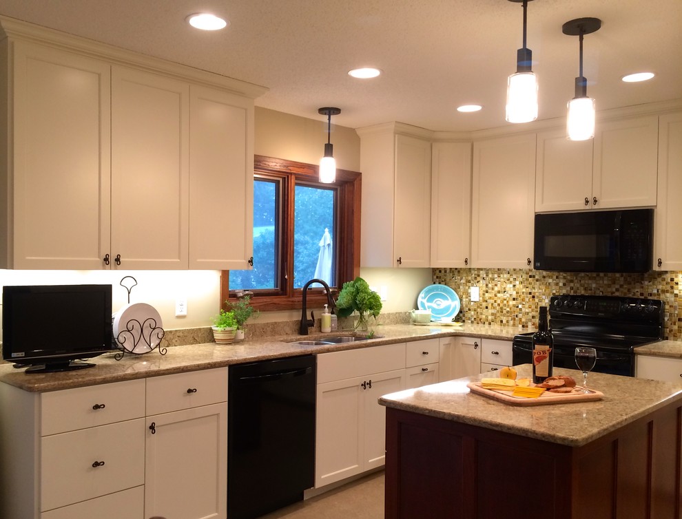 Small transitional u-shaped eat-in kitchen in Minneapolis with a double-bowl sink, shaker cabinets, white cabinets, quartzite benchtops, beige splashback, black appliances, linoleum floors and with island.