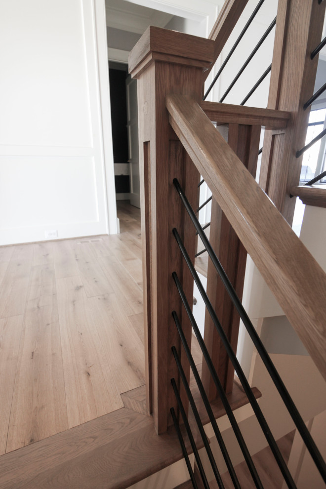 Foto de escalera suspendida vintage grande con escalones de madera, contrahuellas de madera y barandilla de varios materiales