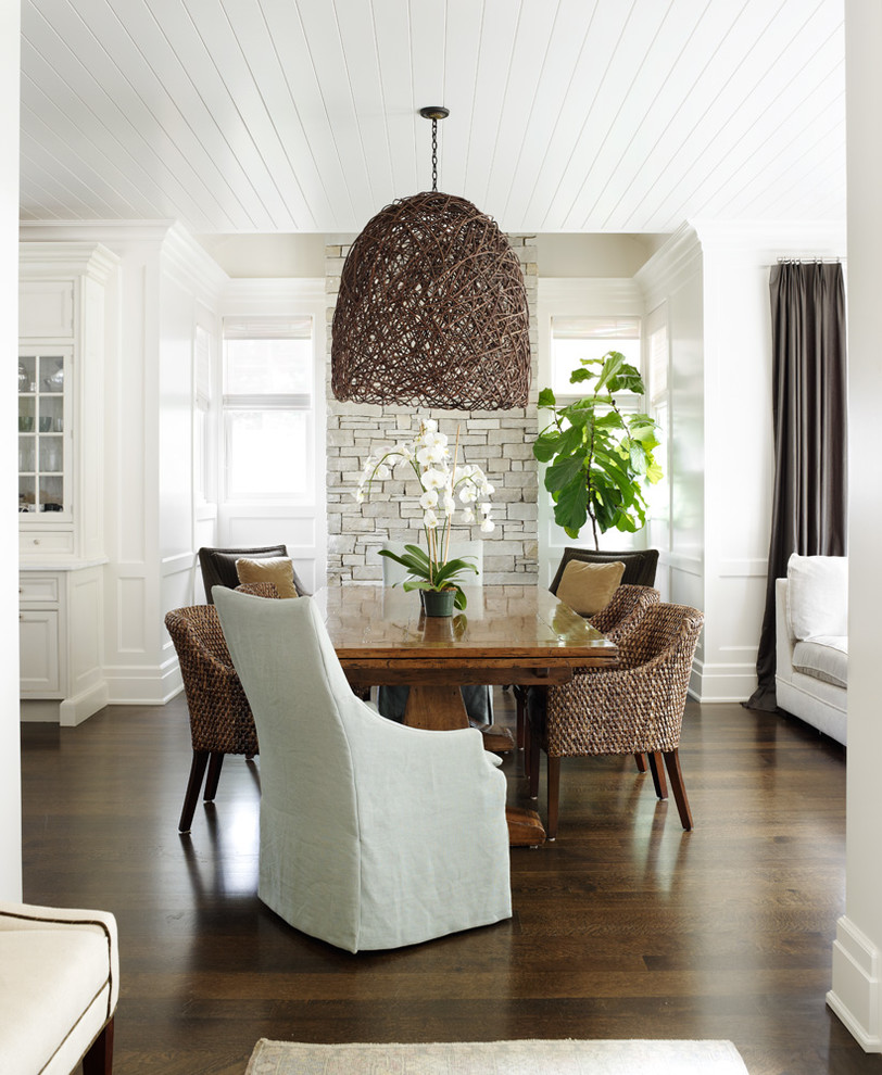 Design ideas for a transitional dining room in Chicago with white walls.