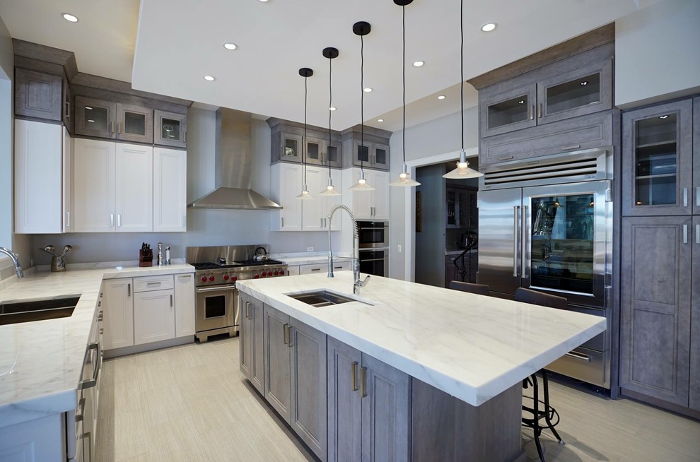 Inspiration for a large contemporary kitchen in DC Metro with shaker cabinets, distressed cabinets, marble benchtops, stainless steel appliances, porcelain floors, with island and grey floor.