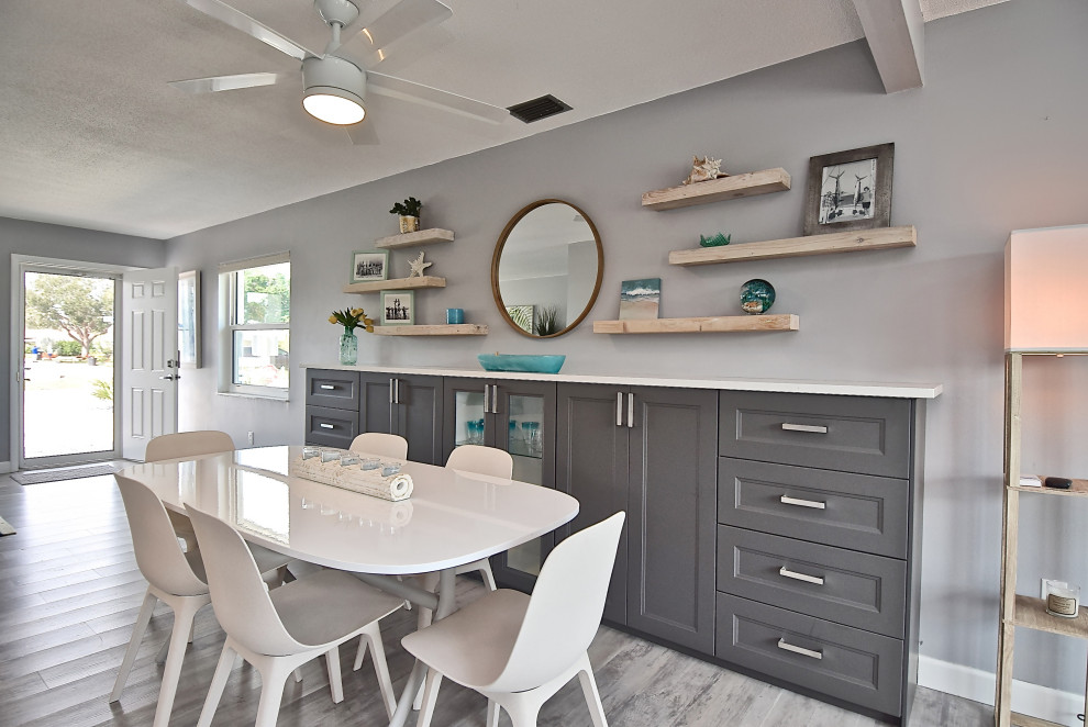 Beach style dining room in Tampa.
