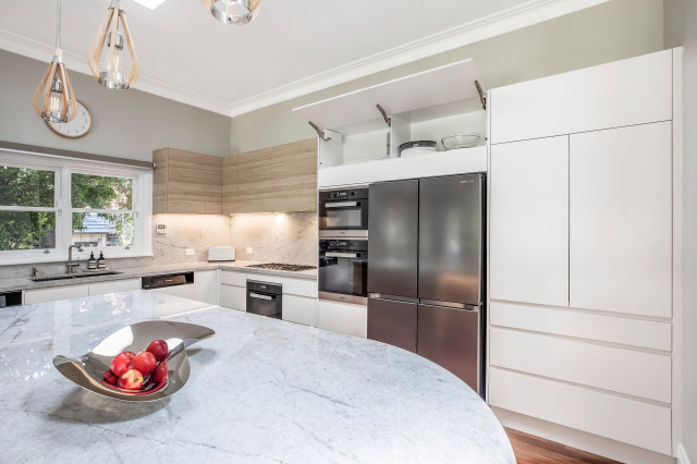 Kitchen with Oxus White Quartzite Benchtops & Splashback contemporary-koek