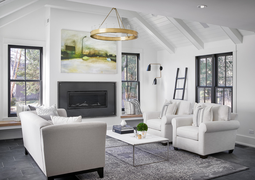 Mid-sized contemporary family room in Chicago with white walls, slate floors, a standard fireplace, a metal fireplace surround, a wall-mounted tv, grey floor and timber.