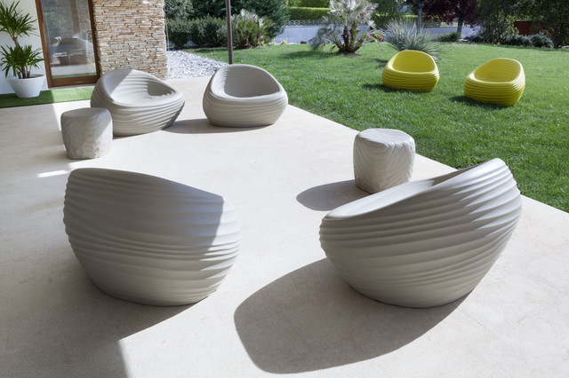 Selling: River Side Lounge Chair And River Stone Side Table contemporary-courtyard