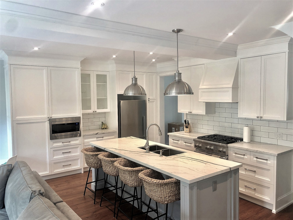 Example of a transitional kitchen design in Toronto