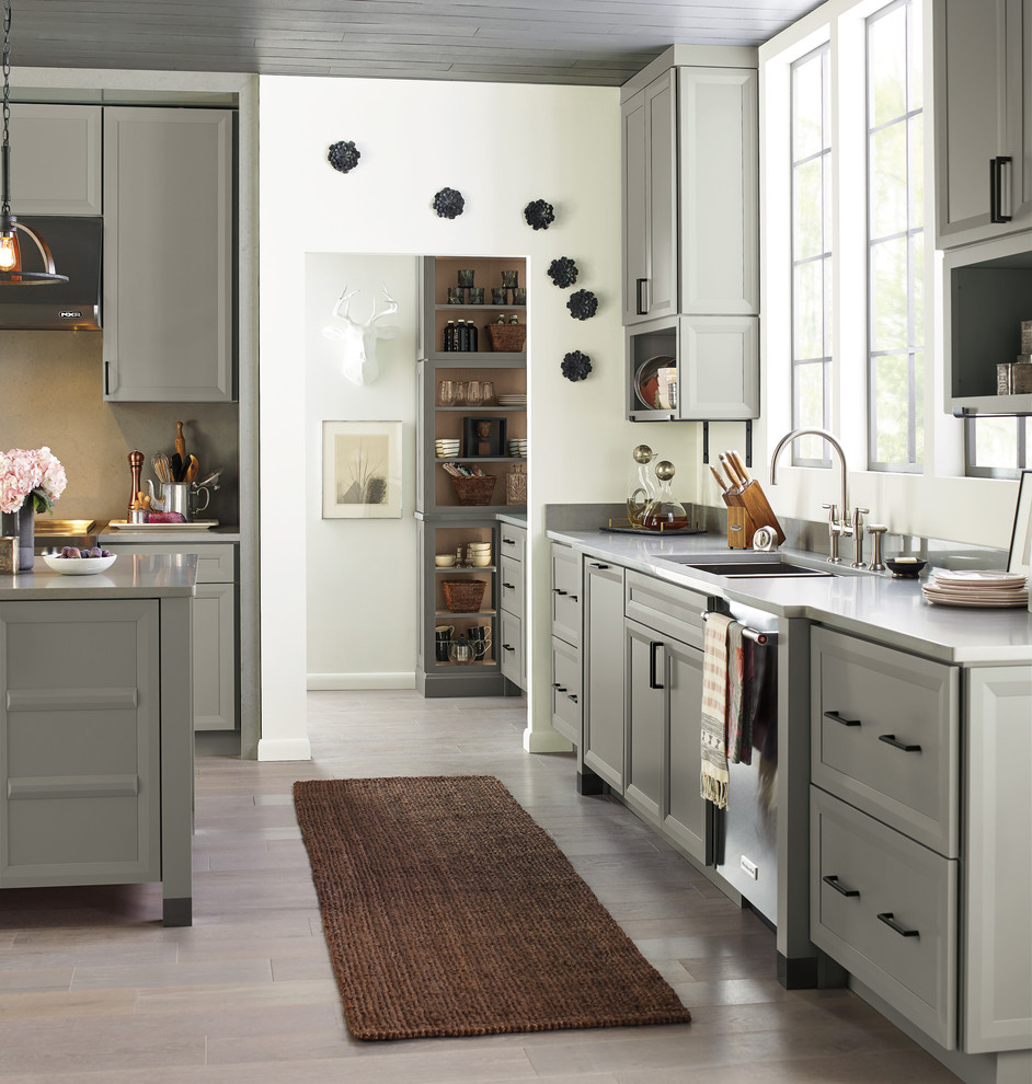 Eat-in kitchen - large transitional light wood floor and gray floor eat-in kitchen idea in Other with stainless steel appliances and an island