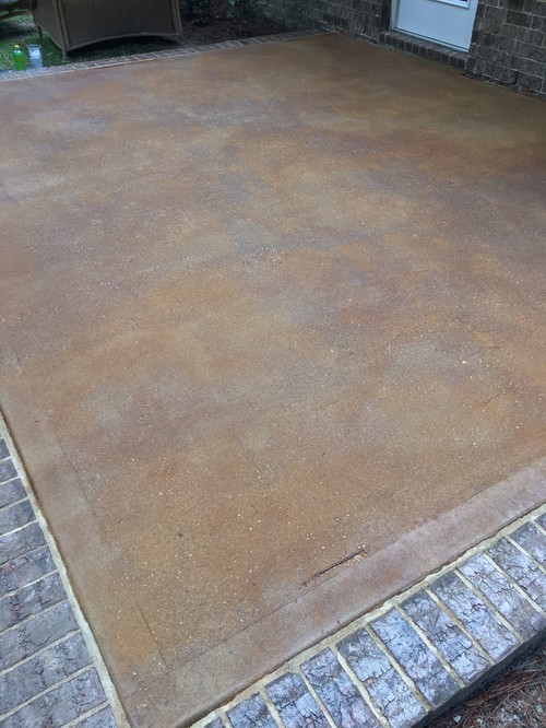 New Stained Concrete Patio To The Concrete Surface And Brick Border Gorgeous Result They Now Have An Outdoor Seating Area That Is Easy Keep Clean Pop Of Color