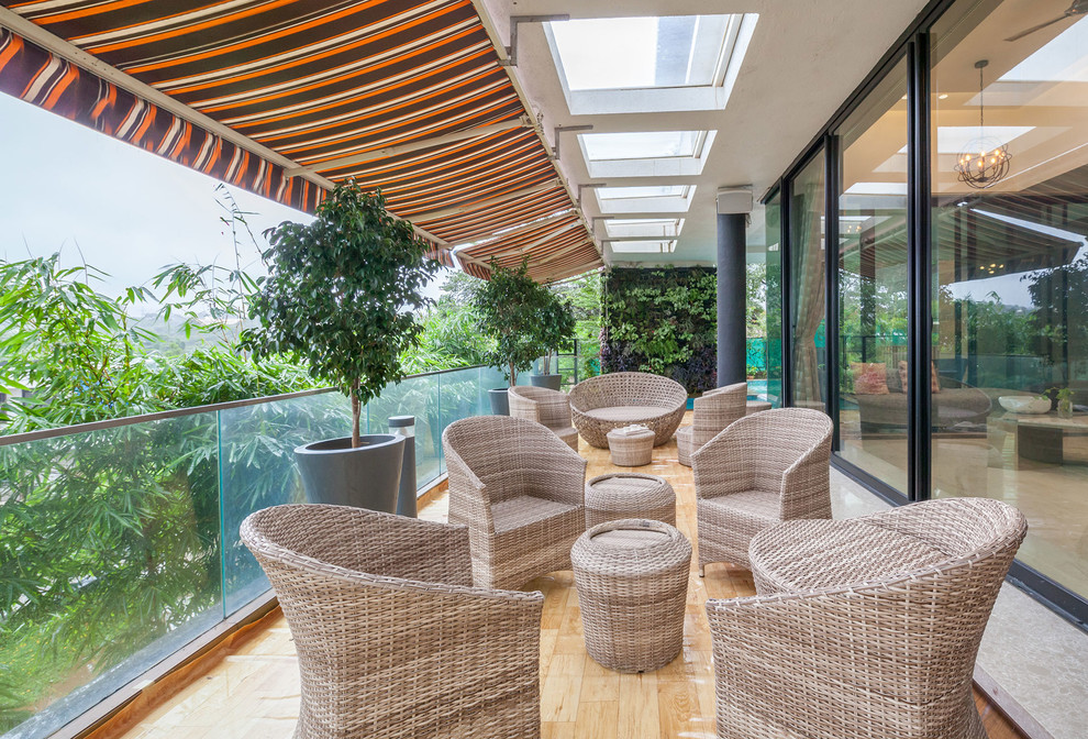 This is an example of a modern patio in Mumbai.