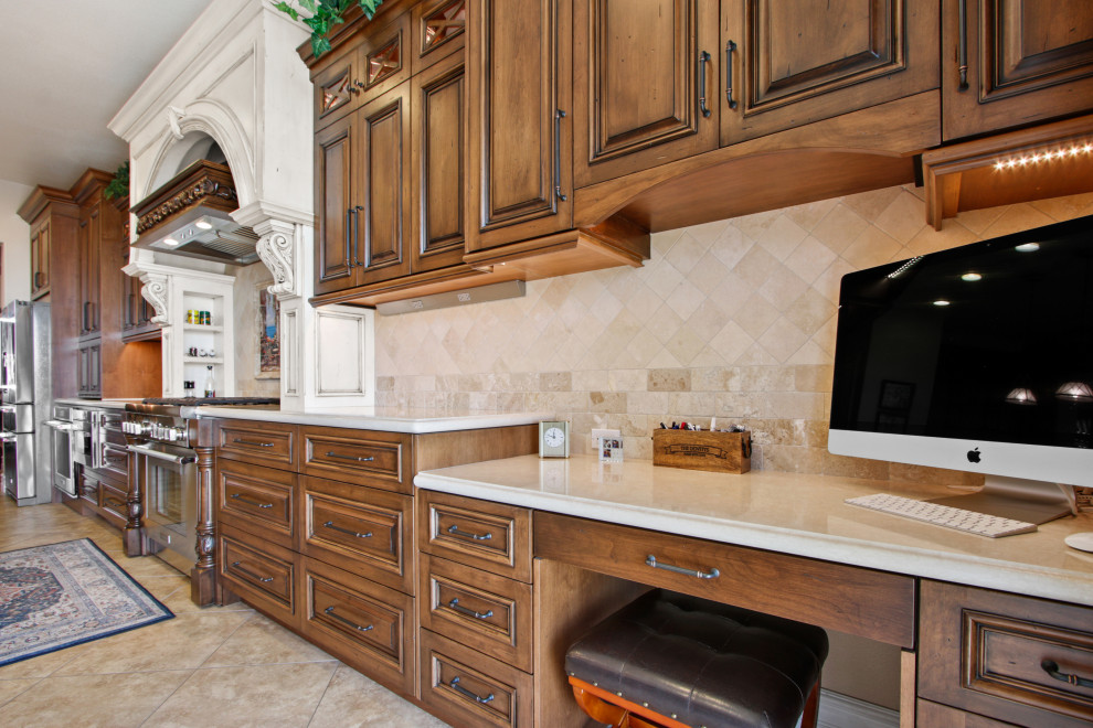 Kitchen - large traditional kitchen idea in Los Angeles with an island