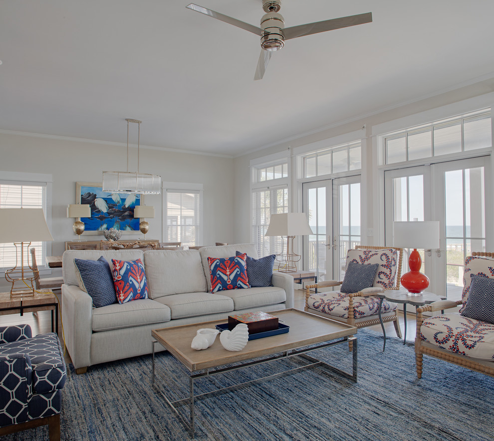 Design ideas for a beach style formal open concept living room in Charleston with grey walls and no fireplace.