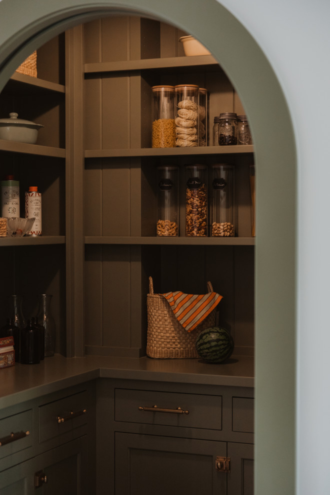 Example of a french country wine cellar design in Minneapolis