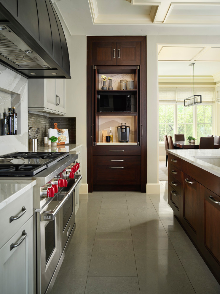 Kitchen - transitional galley porcelain tile kitchen idea in Denver with dark wood cabinets and white countertops