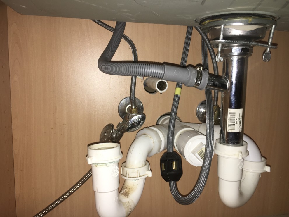 How to hook up sink to pipes