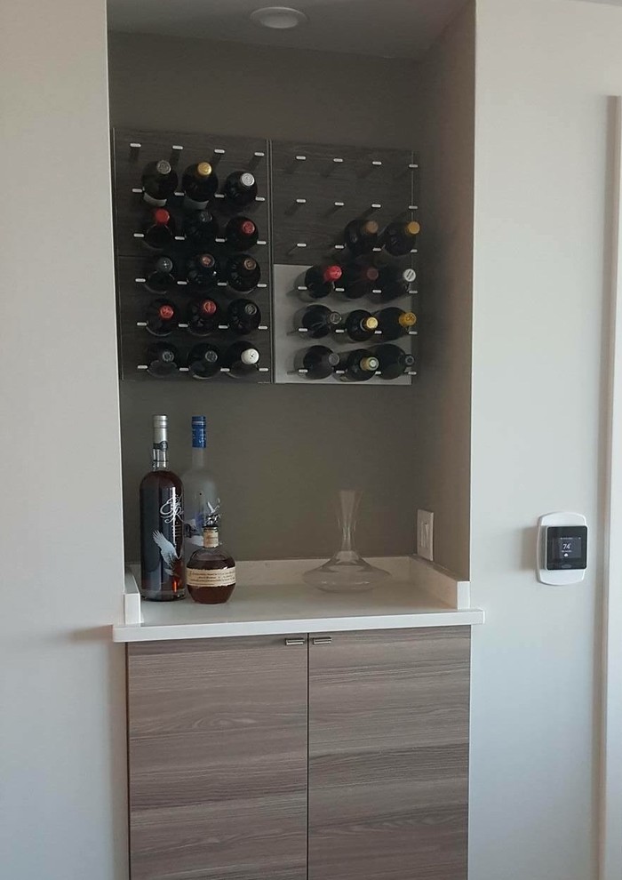 Photo of a small transitional home bar in Atlanta.