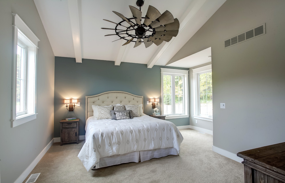 Example of a transitional master carpeted bedroom design in Grand Rapids