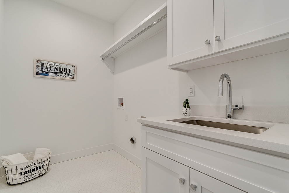 Inspiration for a mid-sized modern galley ceramic tile and white floor dedicated laundry room remodel in Columbus with an undermount sink, shaker cabinets, white cabinets, quartz countertops, white walls, a side-by-side washer/dryer and white countertops