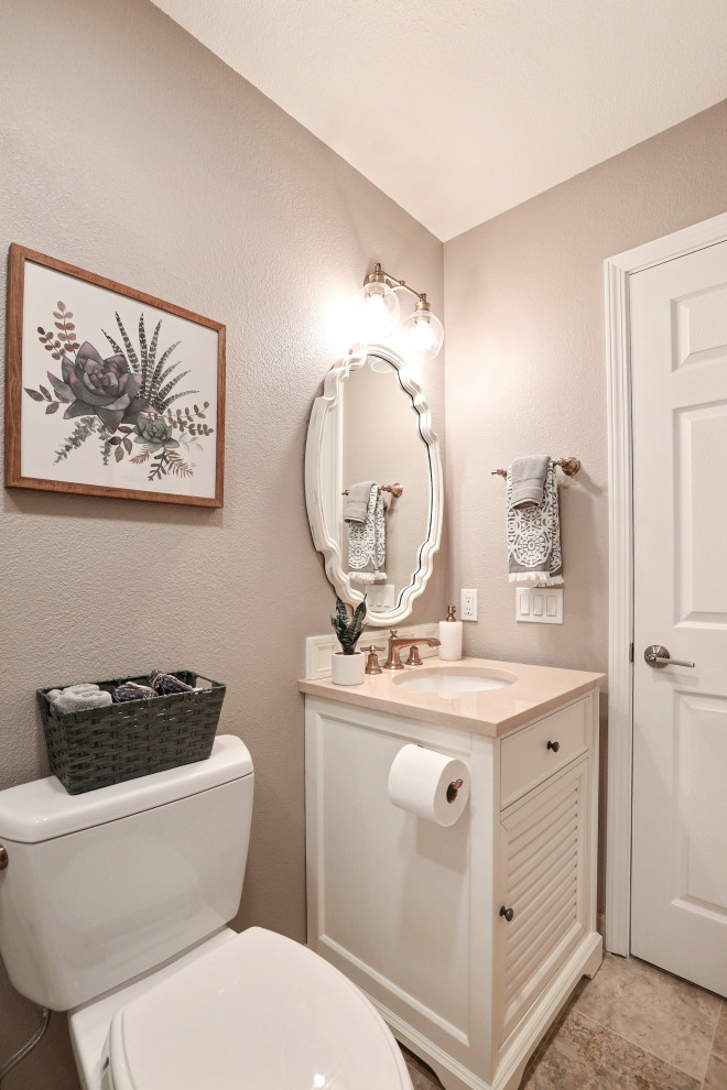 Design ideas for a small country bathroom in San Francisco with louvered cabinets, white cabinets, white tile, ceramic tile, marble floors, an undermount sink, marble benchtops and beige benchtops.