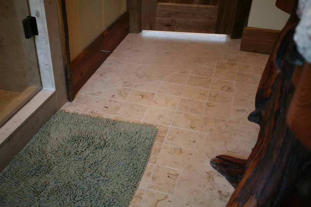 Alcove shower - mid-sized rustic 3/4 porcelain tile and beige floor alcove shower idea with furniture-like cabinets, medium tone wood cabinets, a two-piece toilet, yellow walls, an integrated sink, granite countertops and a hinged shower door