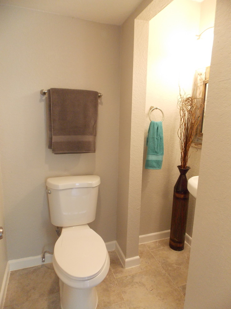 Small contemporary powder room in Austin with a pedestal sink, a two-piece toilet, gray tile, ceramic tile, grey walls and ceramic floors.