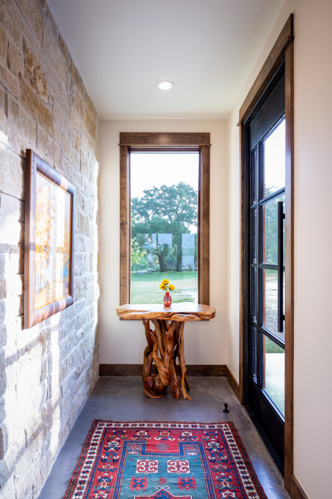 Example of a mountain style entryway design in Austin