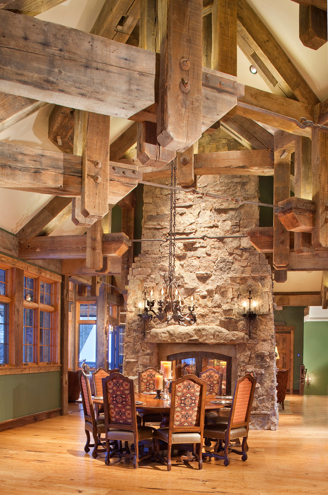 Example of a mountain style dining room design in Denver