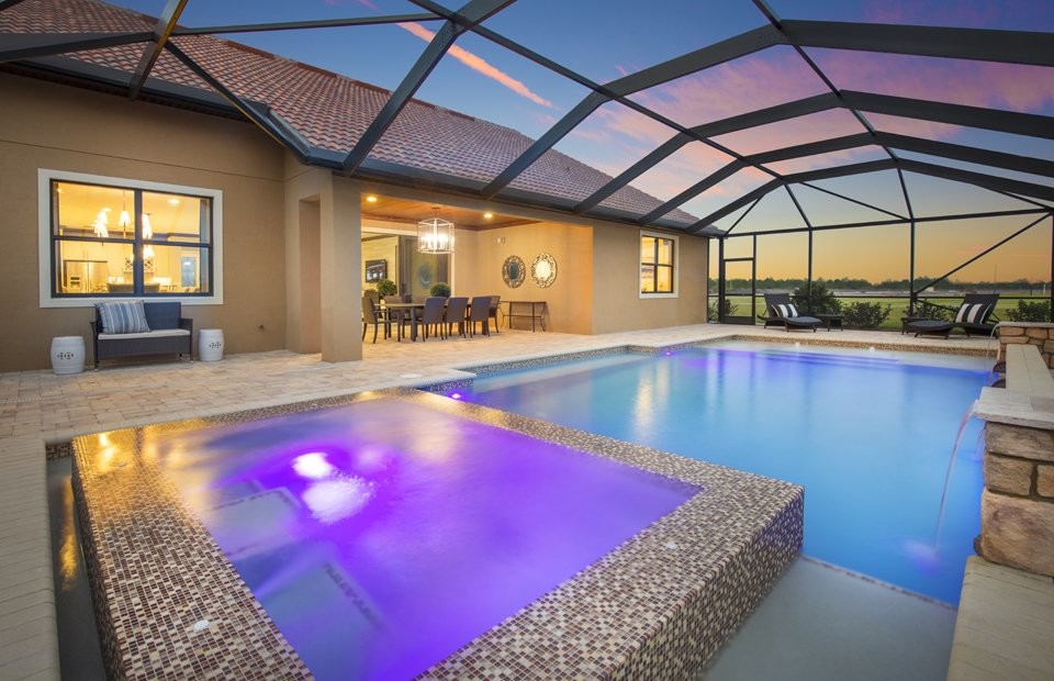 Example of a large transitional indoor concrete paver and rectangular lap hot tub design in Miami