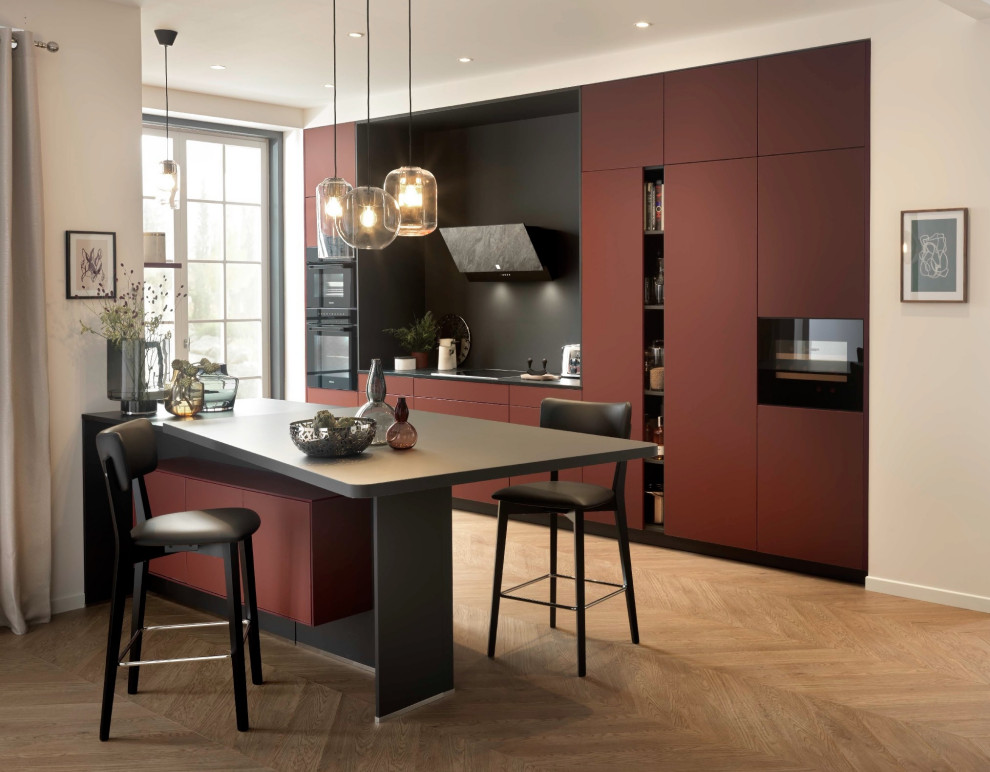 Imagen de cocina lineal, contemporánea, de tamaño medio, abierta, con una isla