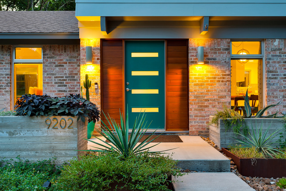 Design ideas for a midcentury entryway in Phoenix.