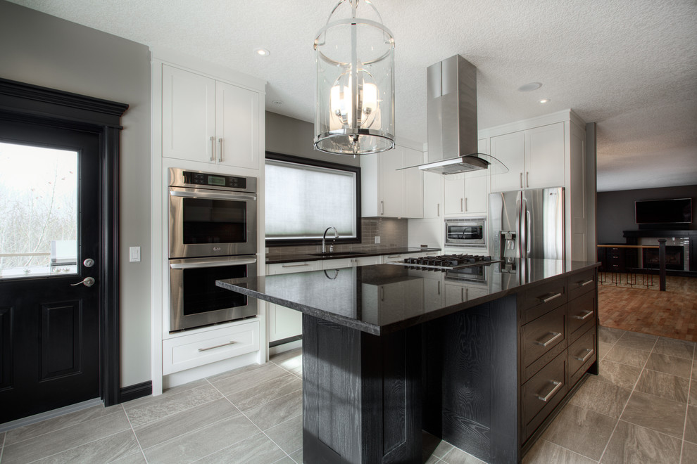 Kitchen - transitional kitchen idea in Calgary