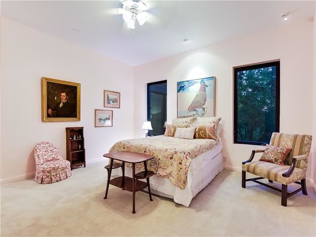 This is an example of an eclectic bedroom in Austin.