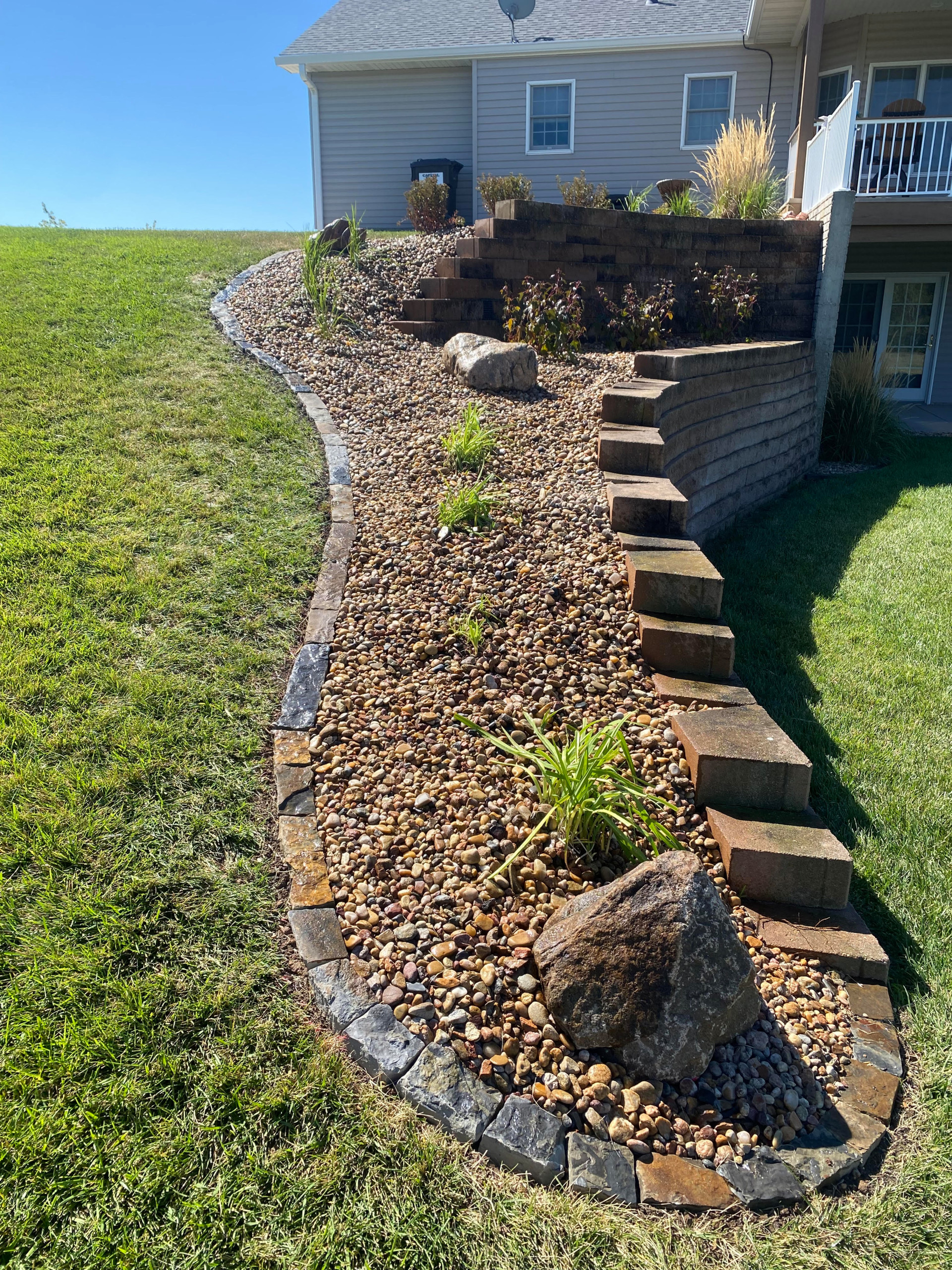 Upper Wall Rebuild & Softscaping