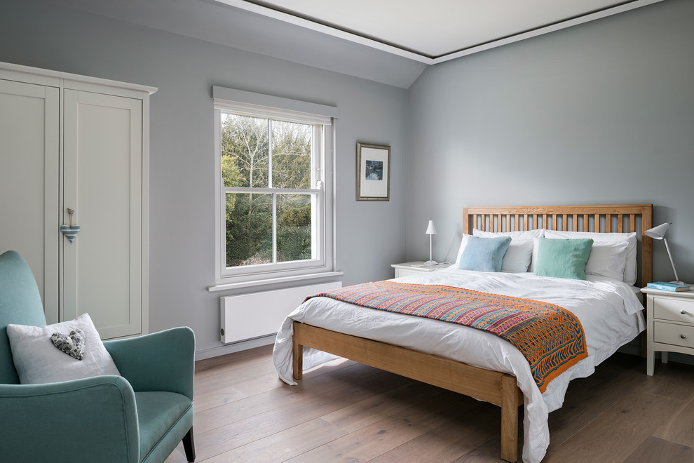 Transitional bedroom in Hampshire.