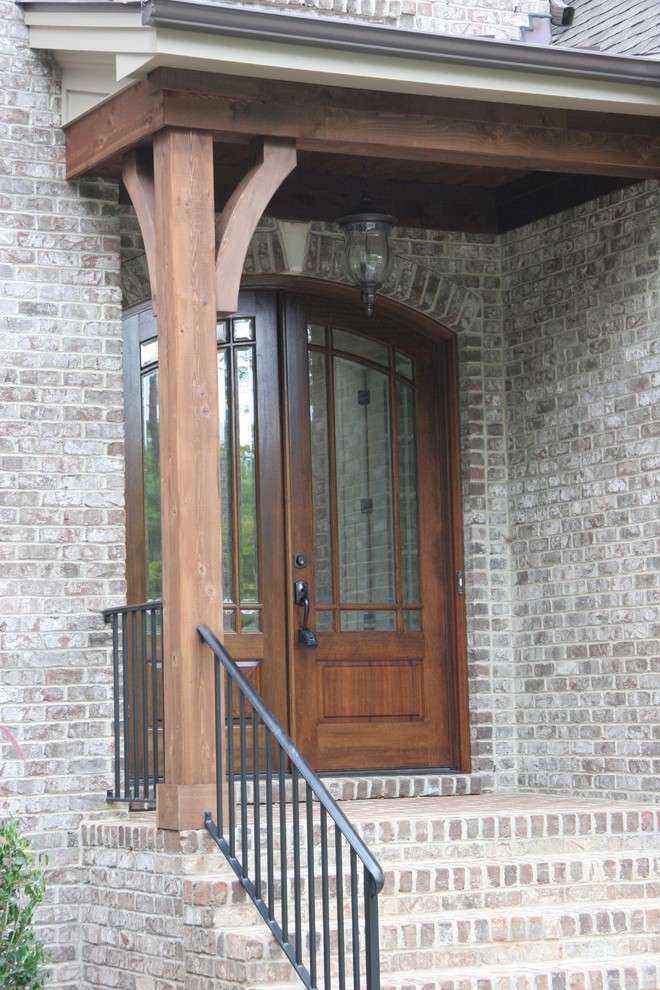 Example of a mountain style home design design in Raleigh