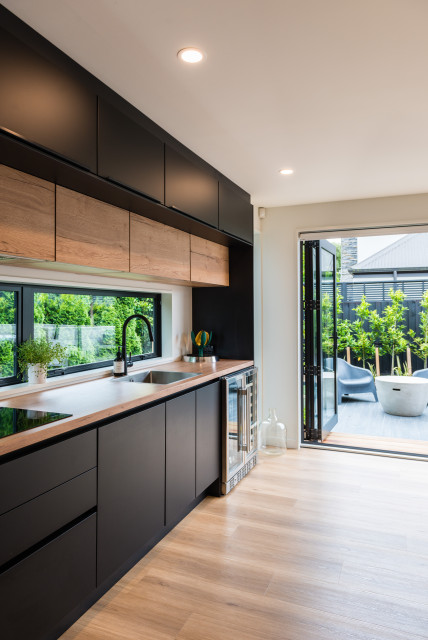 Stunning Black and Wood-Look entertainers kitchen - Contemporary ...