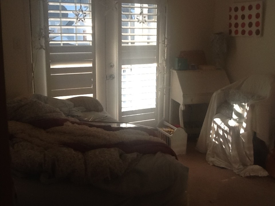 Which wall should the bed be on?